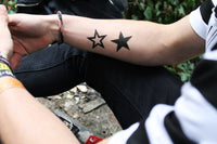 Schwarze Sterne Tattoo