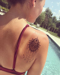 Lotus Mandala Kronleuchter Tattoo