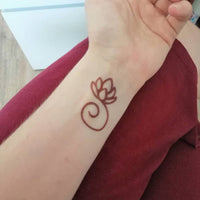 Lotus Weisheit Tattoo