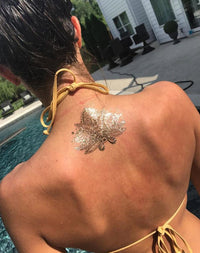 Metallic Gold Lotus Tattoo
