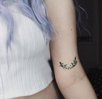 Crescent Watercolor Flowers Tattoo