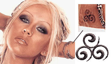 Christina Aguilera - Tatuaggio Spira Decorativa Sacra