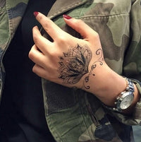 Elegant Lotus Flower Tattoo