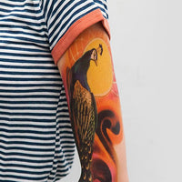Full Sleeve Arm Tattoo Peacock - Tattoonie