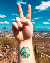 Tatuagem Paz Mundial